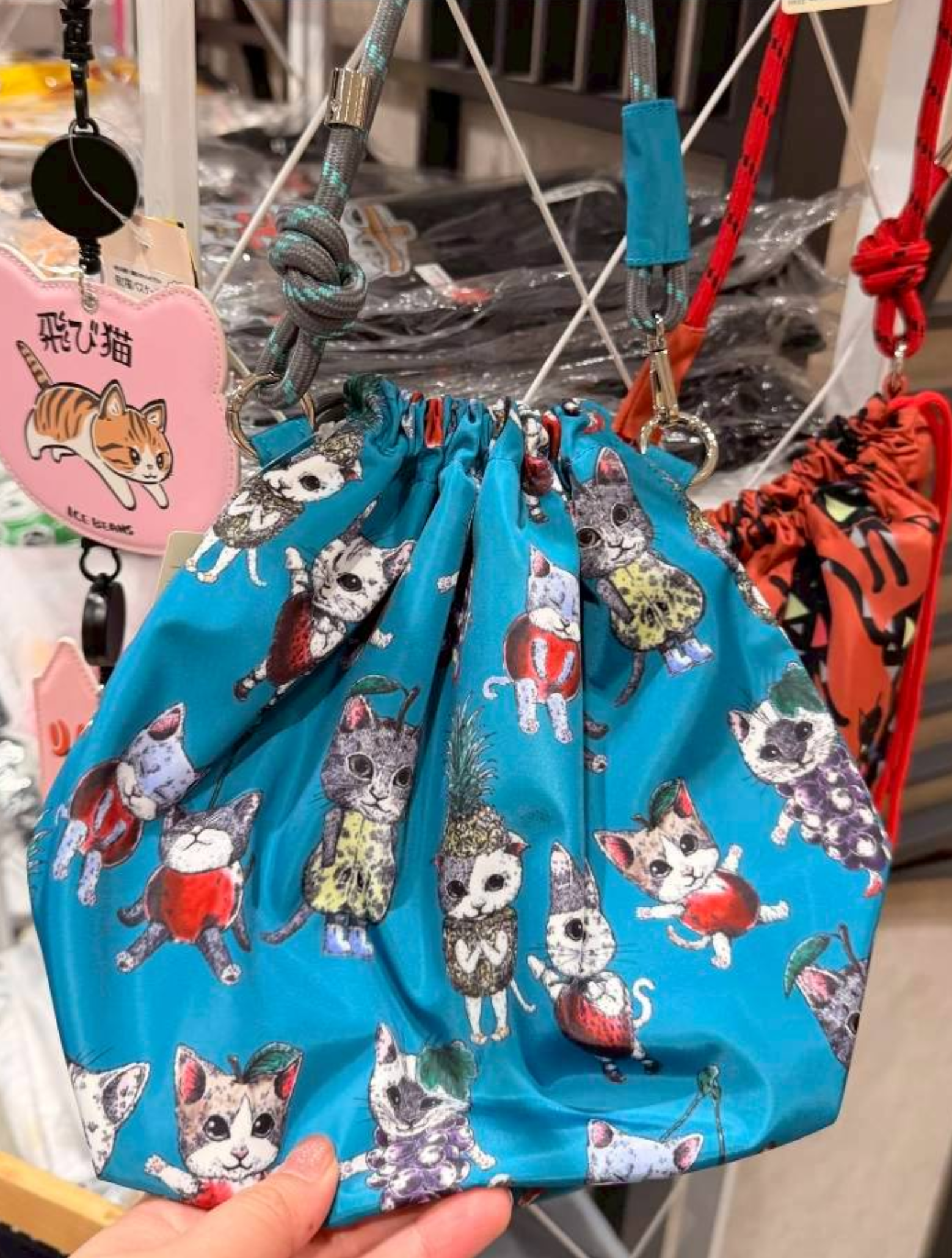 Scolar貓咪圖案束口斜背包