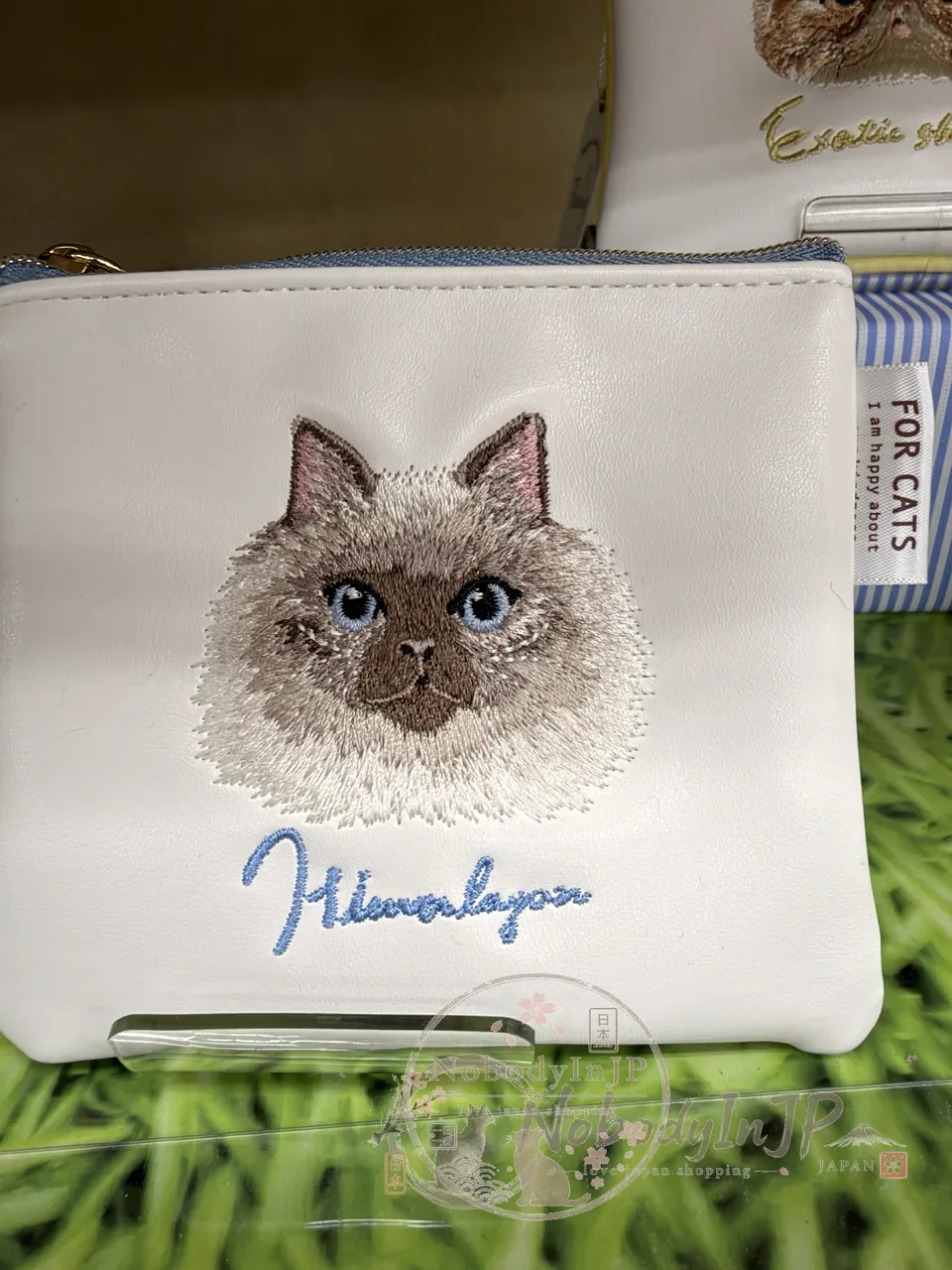FLOWERING貓系刺繡毛球合皮拉錬袋 特價