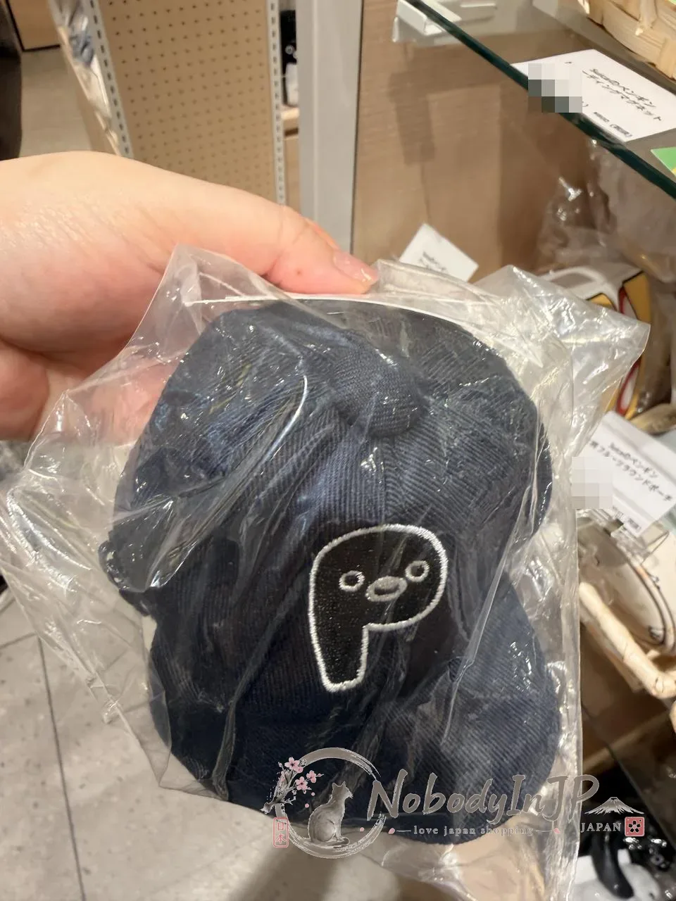Suica企鵝棒球帽造型掛包